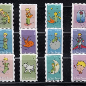 May include: A set of vintage postage stamps depicting scenes from "Le Petit Prince." The stamps feature colourful illustrations of the character, with the text "Le Petit Prince" visible on each stamp.