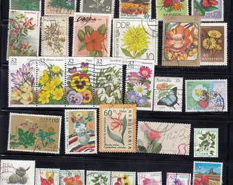 gebrauchte Briefmarkensammlung -- Blume -- off paper-- all different