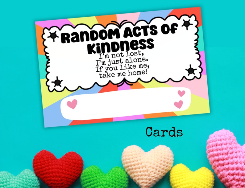 May include: A colorful card with the text "Random Acts of Kindness" and the message "I'm not lost, I'm just alone. If you like me, take me home!"  The card has a blank space for writing a message.