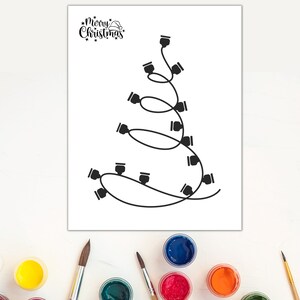 May include: A black and white printable coloring page featuring a Christmas tree made of a string of lights. The text "Merry Christmas" is at the top of the page. The page is surrounded by paint pots and paintbrushes.