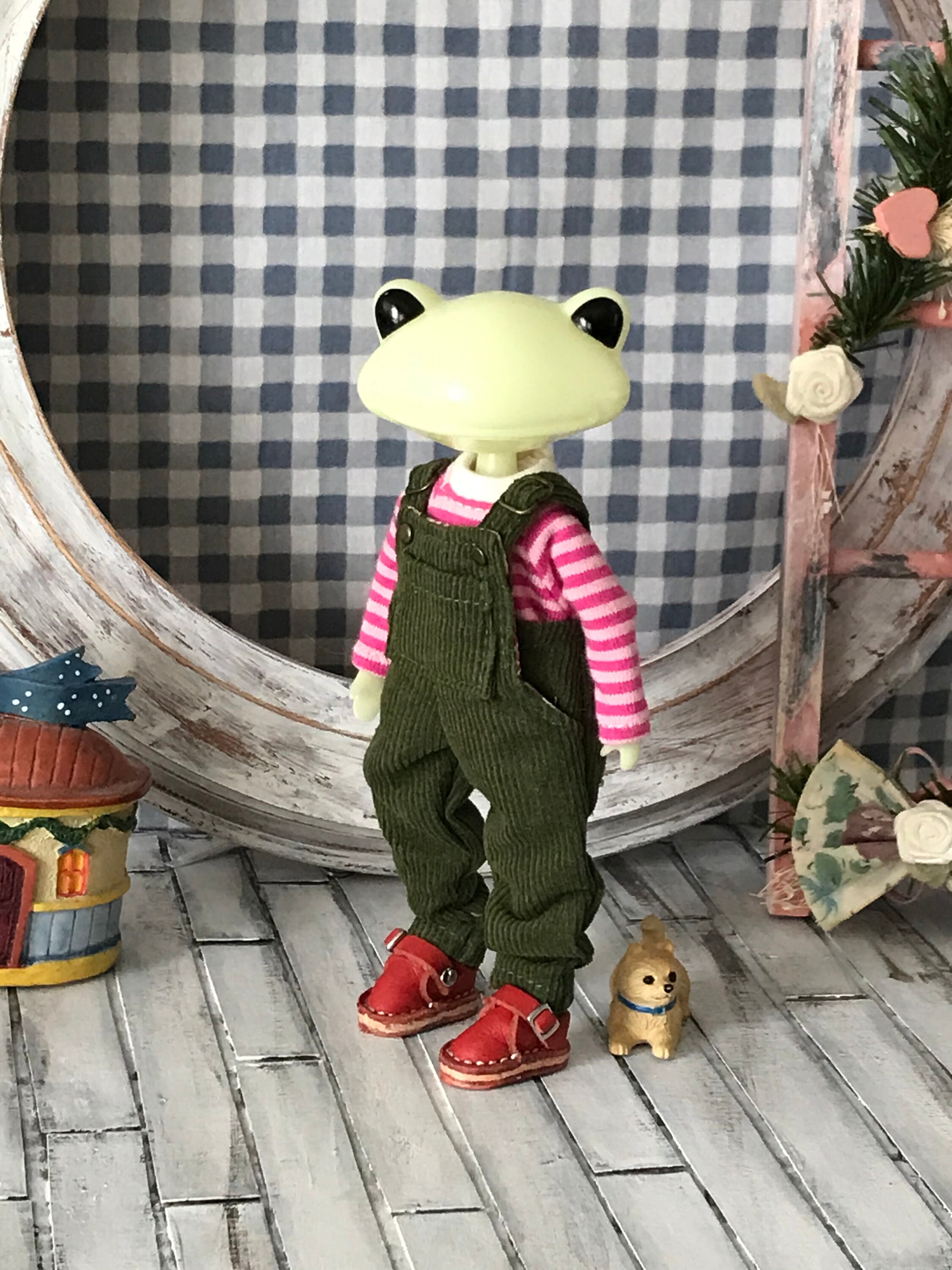 stuffed frog with overalls