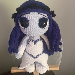 Crochet Emily soft doll with display stand