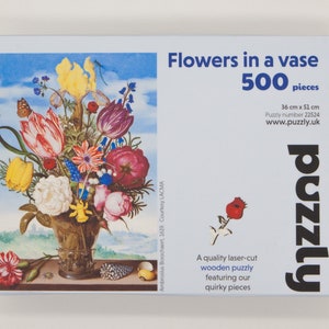 Flowers in a vase by Ambrosius Bosschaert Wooden Puzzle. 500 piece and 70 piece fine art puzzle.  Contains whimsical and regular jigsaw pieces for hours of entertainment.  A wooden puzzle for adults that will become an heirloom.