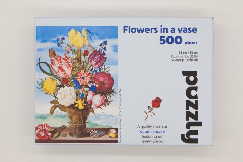 Flowers in a vase by Ambrosius Bosschaert Wooden Puzzle. 500 piece and 70 piece fine art puzzle.  Contains whimsical and regular jigsaw pieces for hours of entertainment.  A wooden puzzle for adults that will become an heirloom.