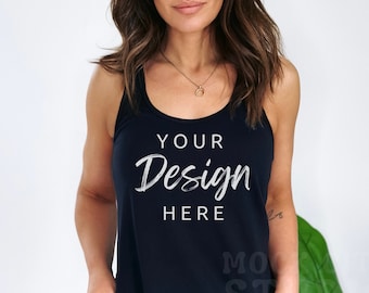 May include: A navy blue tank top with the text "YOUR Design HERE" in white script. The top has a scoop neck and a racerback design. The image is a product mockup.