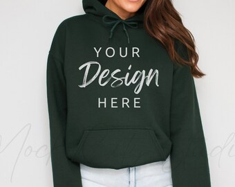 May include: A dark green hooded sweatshirt with the text "YOUR Design HERE" in white lettering.
