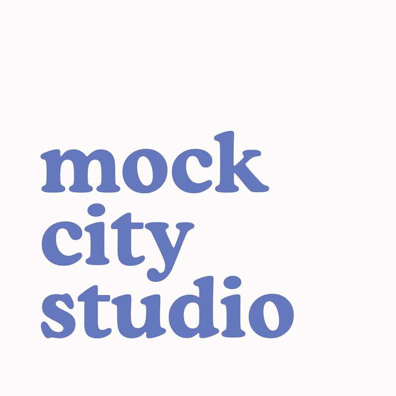 May include: Mock City Studio logo in a light blue color.