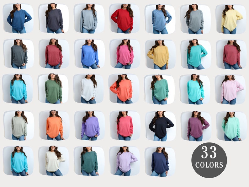May include: A grid of 33 different colored long-sleeve shirts. The shirts are all the same style and fit, but they are shown in a variety of colors, including red, blue, green, yellow, and purple. The text "33 COLORS" is displayed in the bottom right corner of the image.