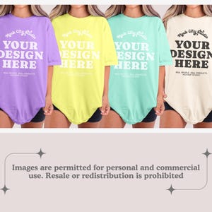 May include: Four oversized t-shirts in different colors: purple, yellow, light blue, and beige. Each shirt has the text "Mock City Studio" and "Your Design Here" printed on the front.