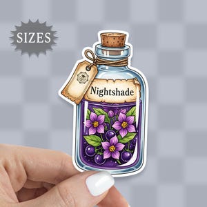 May include: A sticker featuring a cartoon illustration of a potion bottle. The bottle is filled with purple liquid, purple flowers, and berries. The label reads "Nightshade". A cork and a tag are attached to the bottle.