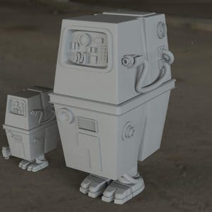 Puede incluir: Dos juguetes robot blancos, uno más grande que el otro, de pie uno al lado del otro. Ambos robots tienen un diseño en forma de caja con bordes redondeados y pequeñas piernas.