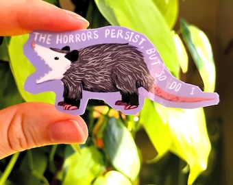 The Horrors Persist Possum Sticker: 2 in & waterproof