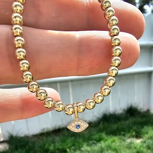 14k Solid Yellow Gold 4mm Bead and Evil Eye Blue Sapphire Diamond Charm Bracelet