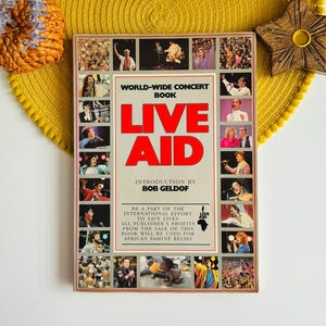 Live Aid 1985 Concert Souvenir Book by Introduced by Bob Geldof, Queen Band Freddie Mercury Madonna Paul McCartney David Bowie U2 Elton John