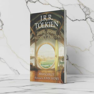 May include: A set of three ceramic mugs with a speckled, matte finish. The mugs are in shades of cream, light gray, and dark gray. Each mug has a simple, minimalist design, perfect for coffee or tea.