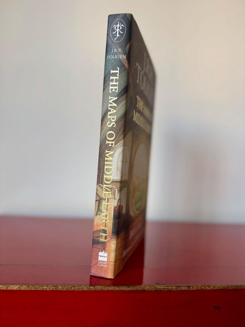 May include: A set of three ceramic mugs with a speckled, matte finish. The mugs are in shades of cream, light gray, and dark gray. Each mug has a simple, minimalist design and a rounded handle.