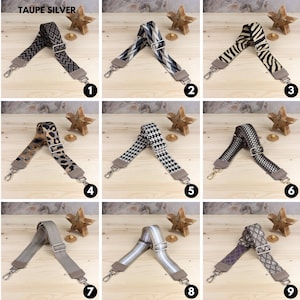 May include: Nine different patterned fabric straps in taupe and silver. The straps are shown laid out on a wooden surface with a star-shaped decoration.
