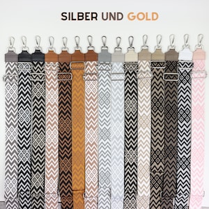 Breite Schulterriemen aus Leder  in jeder Farbe mit Muster für Taschen mit silbernen und goldenen Accessoires, Riemen für Kamerataschen