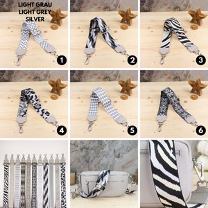 May include: Ten different patterned fabric straps for bags in black and white. The straps are shown on a wooden surface with a star decoration. The straps are 1 inch wide and have silver hardware. The straps are shown in different patterns, including chevron, geometric, and animal print.