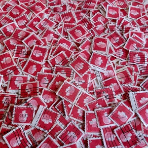Vintage used Canadian Queen Elizabeth 1963 stamps. Carmine color. Red stamps. Off paper, cancelled. No longer in production . Lot of 50.