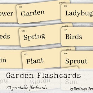 May include: A collection of cream-colored flashcards with black text, featuring garden-related words like "Flower," "Garden," "Ladybug," "Seeds," "Spring," "Birds," "Rain," "Plant," and "Sprout." The words "Garden Flashcards" and "30 printable flashcards" are also visible.