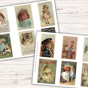 May include: A collection of vintage advertising cards featuring illustrations of children, animals, and product advertisements. The cards display a variety of colors and styles, with text such as "Sunlight Soap" and "Glenwood". The cards are arranged on a light wood surface.