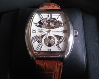 Skeleton watch automatic Earnshaw engraved tonneau stainless steel