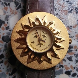 Rare Dali watch "Roy Soleil" goldplated with 2 leather straps, new old stock, 1990,s edt art