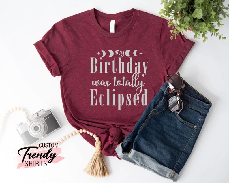 a t - shirt that says, my birthday was totally eclipsed