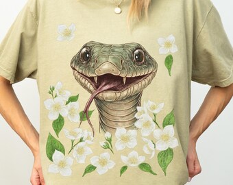 Whimsical Snake T-Shirt, Botanical Graphic Tee, Unisex Casual Wear, Eco-Friendly Fashion, Wildlife Lover Gift, Nature-Inspired Apparel,