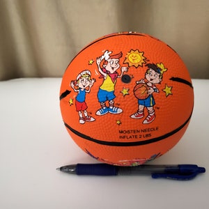 Kellogg child size basketball with various cereal characters, collectable