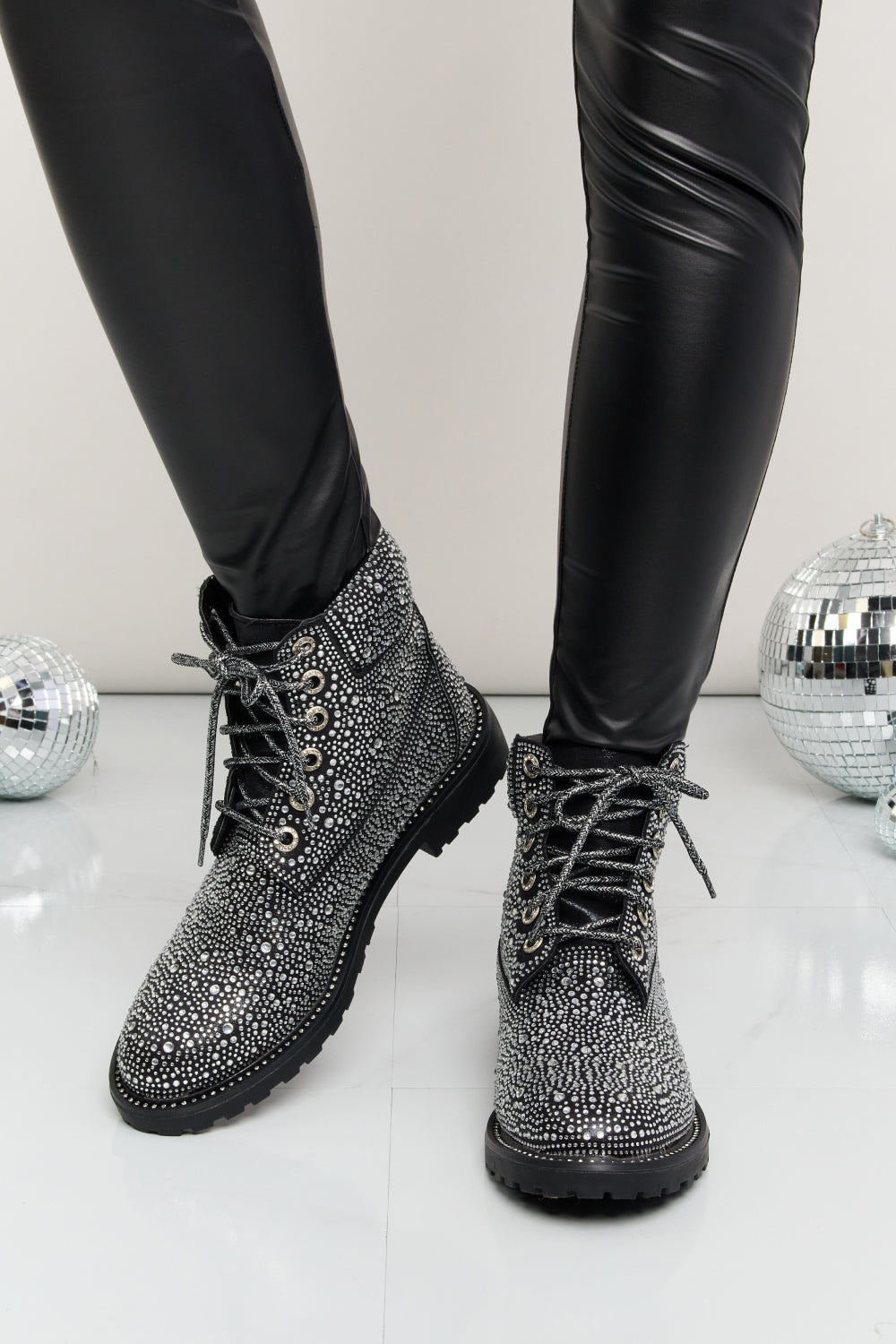 black glitter lace up boots