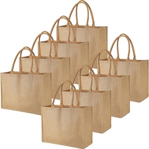 May include: Set of eight natural brown burlap tote bags with brown leather handles. The bags are arranged in a pyramid shape, with the largest bag at the bottom and the smallest bag at the top.