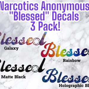 May include: Three "Blessed" decals in a 3-pack. The decals are in galaxy, rainbow, matte black, and holographic blue colors.