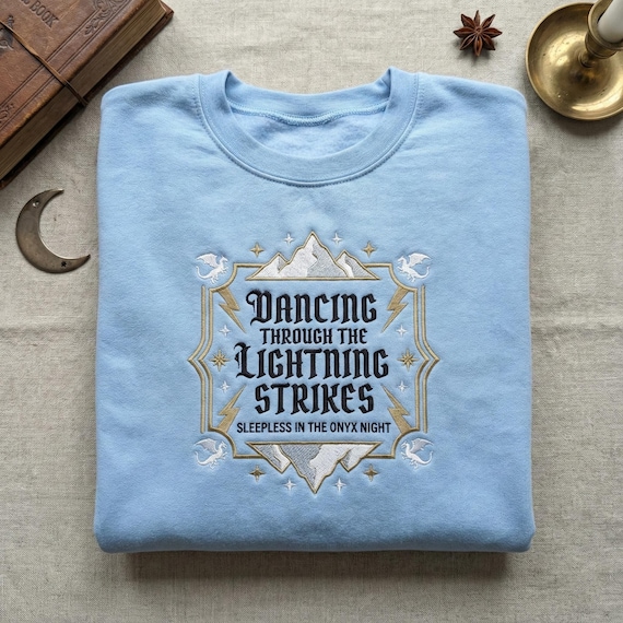 Fourth Wing Inspired Onyx Storm Embroidery Sweatshirt | Dancing Through The Lightning Strikes Dragon Fantasy Crewneck | Bookish Gift