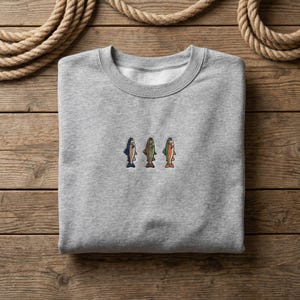 Peut inclure: Panneau en bois rustique avec l'inscription "Welcome to our home" en lettres blanches. Le panneau présente une finition vieillie et un design simple et accueillant, idéal pour la décoration d'entrée.