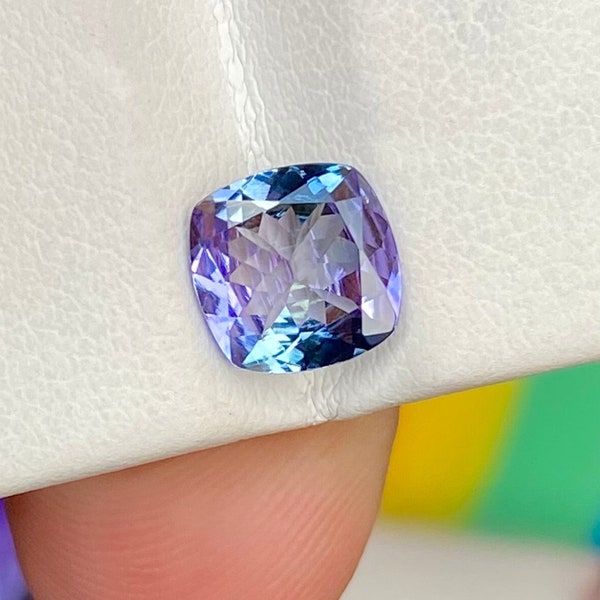 Natural Tanzanite , Cushion Cut , Bi-Colour , 1.35 Cts Weight , Loupe Clean , 7.05 × 7.00 MM Size , Window In This Gemstone