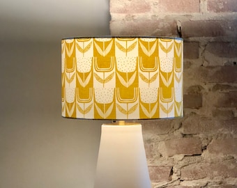 Nice table lamp with earthenware base and shade with stylistic flowers in ocher yellow