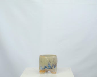 Hand-Built Beige Ceramics Cup with Legs