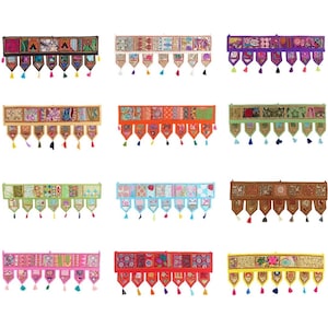 May include: Twelve colorful fabric door or window valances with tassels. Each valance is made of patchwork fabric with different patterns and colors. The valances are arranged in three rows of four.