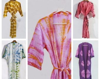 May include: Five different tie-dye robes in various colors, including pink, yellow, blue, and purple. The robes are all made of a soft, lightweight fabric and have a relaxed fit.
