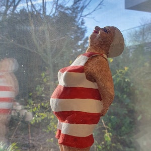 Bathing woman enjoys the sun -- several color variations