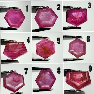 May include: A grid of nine faceted pink gemstones held by metal tweezers, labeled with numbers one through nine. The collection includes various hexagonal and pentagonal shapes, each displaying unique internal inclusions and vibrant pink hues.