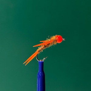 NEW Florescent Hot Orange Stonefly! Fast sinking, durable and very imitative. Great Euro pattern or under an indicator!