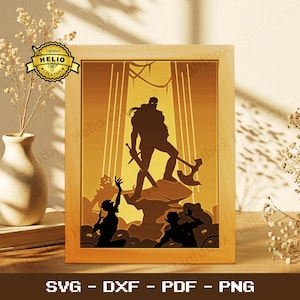 May include: A wooden framed, layered paper art piece depicting a warrior silhouette with a sword and axe, standing on a rock formation. The artwork has a warm, golden colour scheme with the text "SVG - DXF - PDF - PNG".