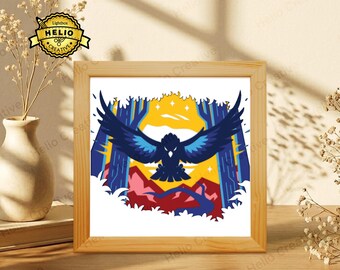 May include: A framed digital art print showing a dark blue raven with outstretched wings, set against a forest and mountains. The artwork includes the text "SVG - DXF - PDF - PNG".