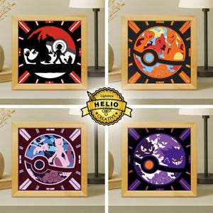 May include: Four framed shadow box art pieces with a Pokemon theme. Each piece features a different Pokemon design in a circular format, with a wooden frame. The art pieces are displayed on a shelf with lamps.
