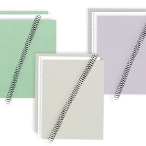 May include: Three spiral bound notebooks with white perforated pages. The notebooks are in different colors: green, gray, and light purple.