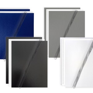 May include: Set of four spiral bound notebooks with covers in white, gray, black, and blue.