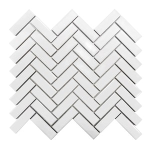 May include: White ceramic tile mosaic in a herringbone pattern. The tiles are rectangular and glossy.